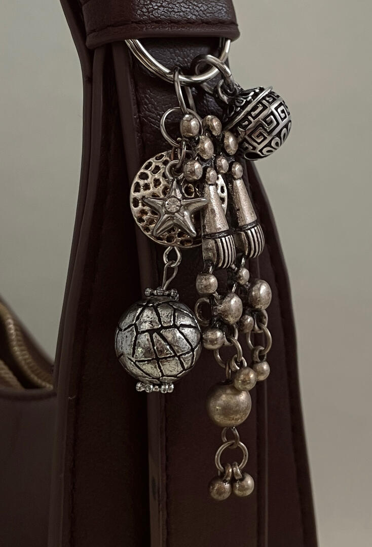 Silver bag charm
